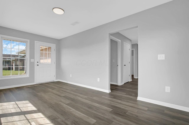 406 Aarika Dr, West Jefferson, OH 43162 - unfurnished room with dark wood-style floors and baseboards