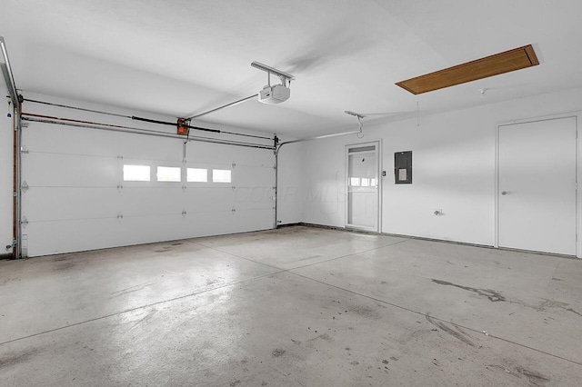 406 Aarika Dr, West Jefferson, OH 43162 - garage featuring electric panel and a garage door opener