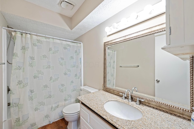 3033 Highcliff Ct, Columbus, OH 43231 - bathroom with vanity, wood finished floors, and a textured ceiling