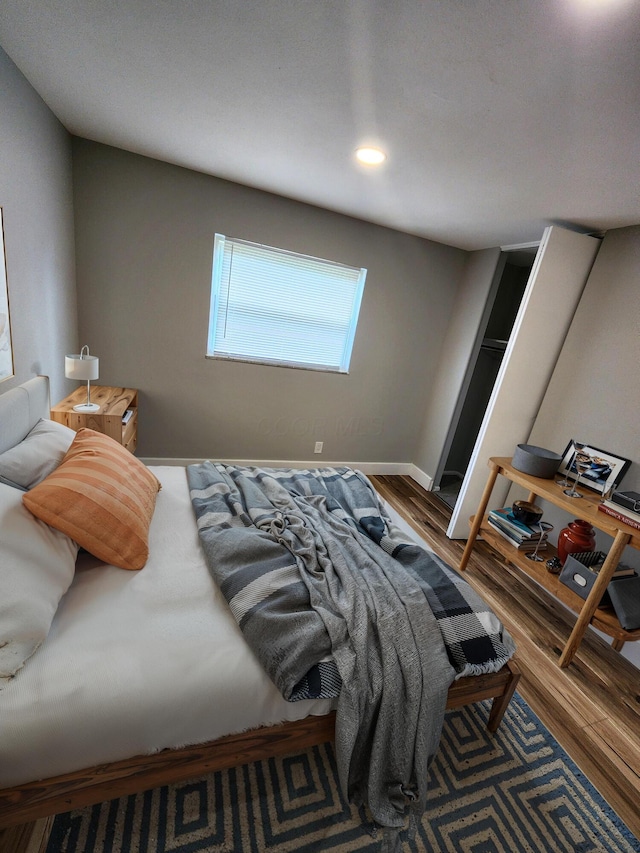 1826 Fleming Rd, Columbus, OH 43232 - bedroom with wood finished floors and recessed lighting