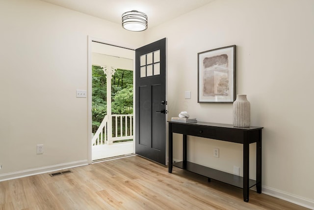 13900 Justin Rd, Utica, OH 43080 - entryway featuring light wood-style flooring and baseboards