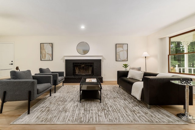 13900 Justin Rd, Utica, OH 43080 - living room with wood finished floors and a fireplace