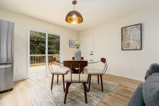 13900 Justin Rd, Utica, OH 43080 - dining space with light wood-style flooring and baseboards