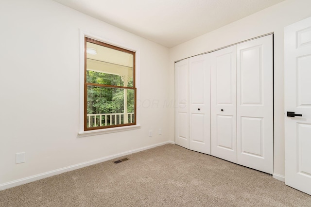 13900 Justin Rd, Utica, OH 43080 - unfurnished bedroom with carpet flooring and a closet