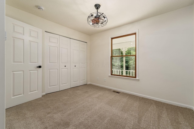 13900 Justin Rd, Utica, OH 43080 - unfurnished bedroom with carpet and a closet