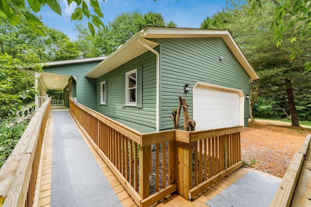 13900 Justin Rd, Utica, OH 43080 - view of side of home featuring a garage