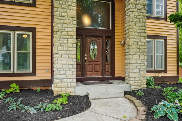 4867 Sarasota Ct, Hilliard, OH 43026 - view of exterior entry featuring stone siding