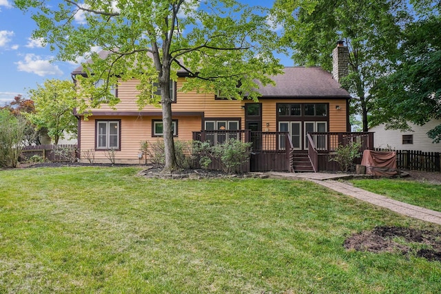 4867 Sarasota Ct, Hilliard, OH 43026 - back of house with a fenced backyard, a wooden deck, and a chimney
