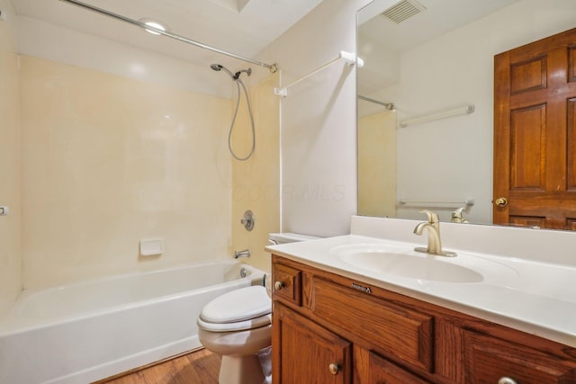 4867 Sarasota Ct, Hilliard, OH 43026 - bathroom featuring tub / shower combination, vanity, and wood finished floors