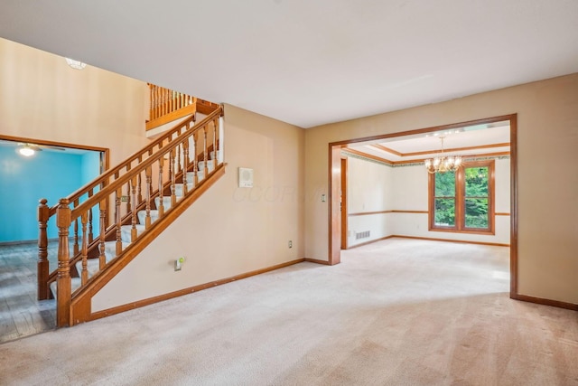 4867 Sarasota Ct, Hilliard, OH 43026 - unfurnished living room with carpet flooring, a chandelier, and stairway