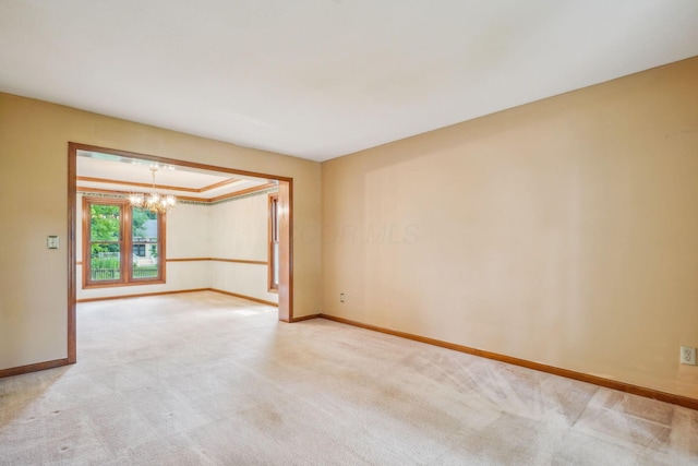 4867 Sarasota Ct, Hilliard, OH 43026 - spare room with light carpet and a chandelier