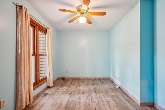 4867 Sarasota Ct, Hilliard, OH 43026 - spare room featuring plenty of natural light, wood finished floors, and ceiling fan