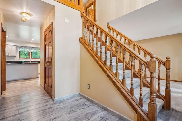 4867 Sarasota Ct, Hilliard, OH 43026 - stairs featuring wood finished floors