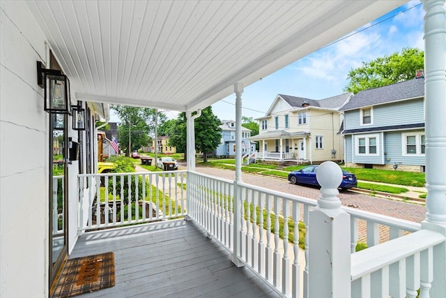 114 N 7th St, Newark, OH 43055 - wooden porch with a residential view
