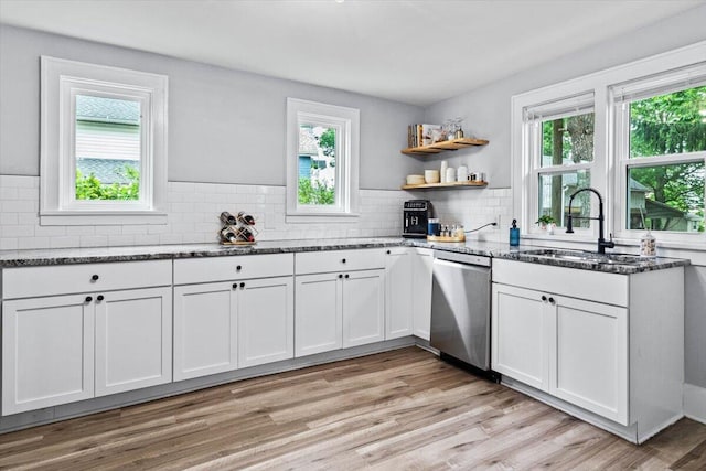 114 N 7th St, Newark, OH 43055 - kitchen featuring dishwasher, stone counters, plenty of natural light, and white cabinetry