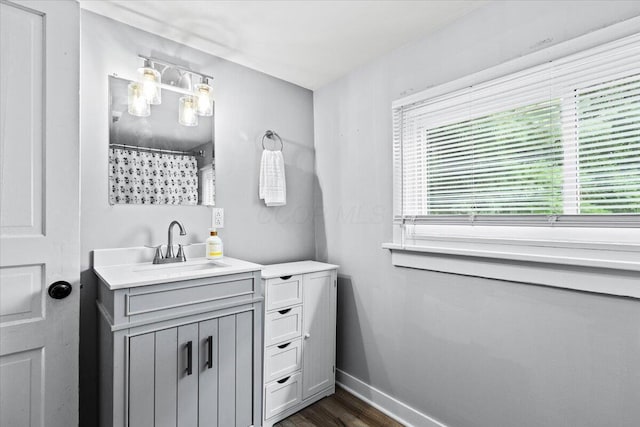 114 N 7th St, Newark, OH 43055 - full bathroom featuring vanity, wood finished floors, and curtained shower