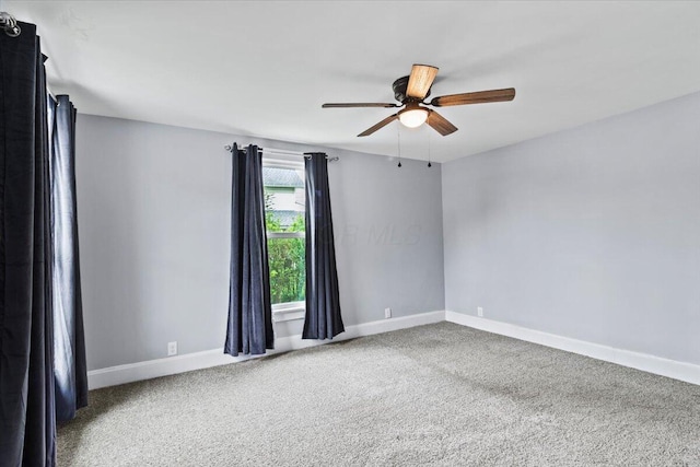 114 N 7th St, Newark, OH 43055 - carpeted empty room with ceiling fan and baseboards