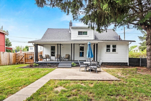 114 N 7th St, Newark, OH 43055 - rear view of property with a chimney, a gate, a patio, ceiling fan, and roof with shingles
