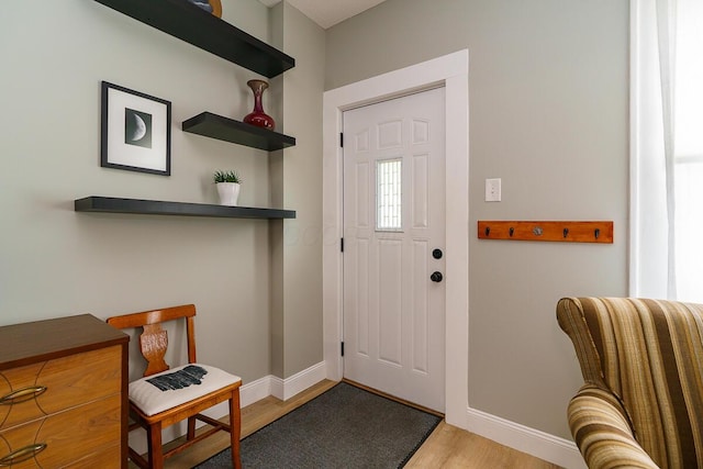 2686 Wicklow Rd, Columbus, OH 43204 - entryway featuring baseboards and light wood-style flooring
