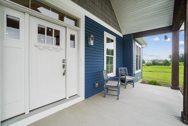 25500 Storms Rd, West Mansfield, OH 43358 - doorway to property with a porch