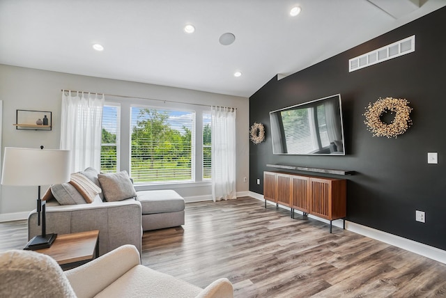 25500 Storms Rd, West Mansfield, OH 43358 - living room featuring vaulted ceiling, wood finished floors, and recessed lighting