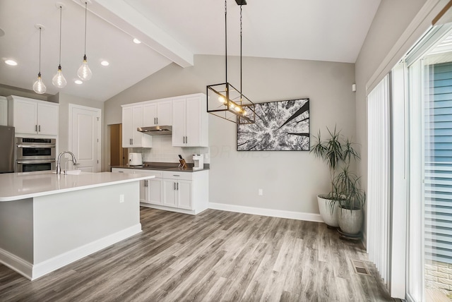 25500 Storms Rd, West Mansfield, OH 43358 - kitchen featuring wood finished floors, double oven, tasteful backsplash, black electric stovetop, and recessed lighting