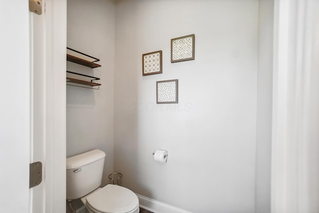 25500 Storms Rd, West Mansfield, OH 43358 - bathroom with toilet and baseboards