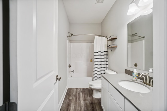 25500 Storms Rd, West Mansfield, OH 43358 - full bath with wood finished floors, vanity, and shower / bathtub combination with curtain