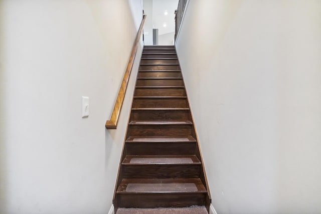 25500 Storms Rd, West Mansfield, OH 43358 - staircase with a towering ceiling and baseboards