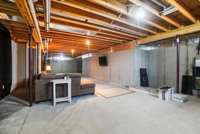 25500 Storms Rd, West Mansfield, OH 43358 - unfinished below grade area featuring brick wall
