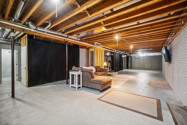 25500 Storms Rd, West Mansfield, OH 43358 - unfinished basement with brick wall