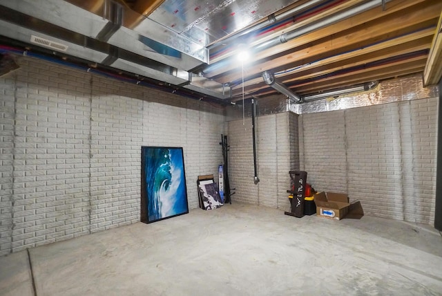 25500 Storms Rd, West Mansfield, OH 43358 - unfinished basement featuring brick wall
