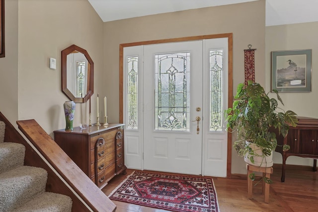 680 Rainbow Dr NW, Lancaster, OH 43130 - entrance foyer featuring stairs and wood finished floors