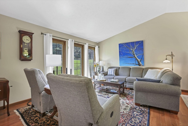 680 Rainbow Dr NW, Lancaster, OH 43130 - living area with lofted ceiling and wood finished floors