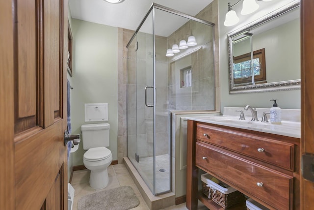 680 Rainbow Dr NW, Lancaster, OH 43130 - full bathroom featuring vanity, a shower stall, and tile patterned flooring