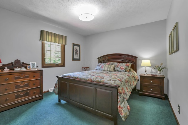 680 Rainbow Dr NW, Lancaster, OH 43130 - bedroom with dark colored carpet and a textured ceiling