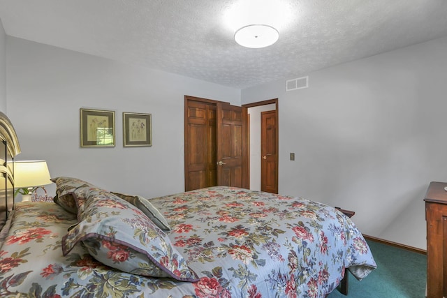 680 Rainbow Dr NW, Lancaster, OH 43130 - carpeted bedroom with a closet and a textured ceiling