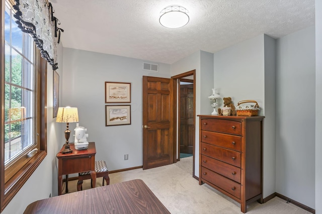 680 Rainbow Dr NW, Lancaster, OH 43130 - bedroom with light colored carpet and a textured ceiling