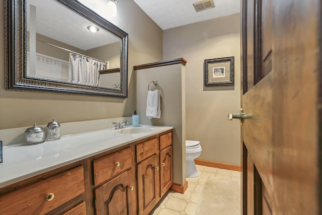 680 Rainbow Dr NW, Lancaster, OH 43130 - bathroom featuring toilet and vanity