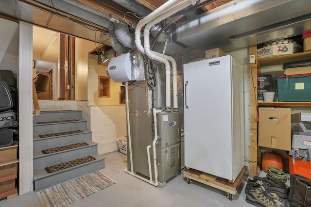 680 Rainbow Dr NW, Lancaster, OH 43130 - unfinished basement featuring heating unit and concrete block wall