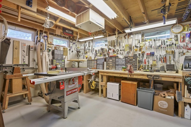 680 Rainbow Dr NW, Lancaster, OH 43130 - miscellaneous room featuring a workshop area and concrete floors