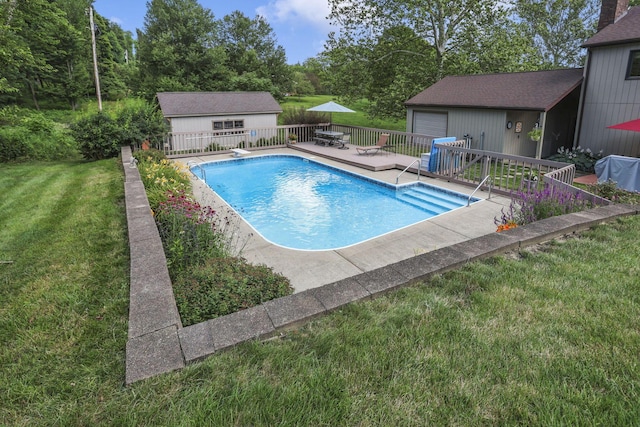 680 Rainbow Dr NW, Lancaster, OH 43130 - view of pool featuring a wooden deck, an outdoor structure, and a yard