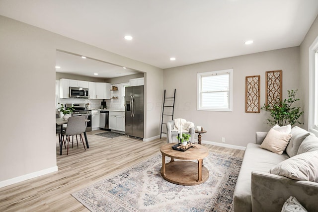 3432 Walmar Dr, Columbus, OH 43224 - living area featuring light wood-style flooring and recessed lighting