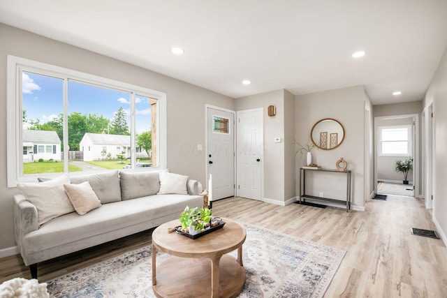 3432 Walmar Dr, Columbus, OH 43224 - living room featuring light wood-style floors and recessed lighting