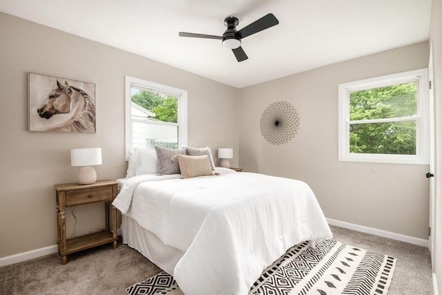 3432 Walmar Dr, Columbus, OH 43224 - bedroom featuring light carpet and a ceiling fan