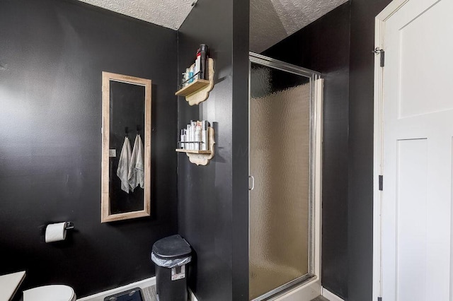 9710 Butcher Rd, Mount Vernon, OH 43050 - full bath featuring a shower stall and a textured ceiling