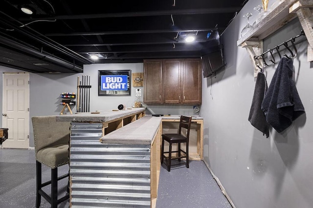 9710 Butcher Rd, Mount Vernon, OH 43050 - indoor dry bar featuring concrete flooring