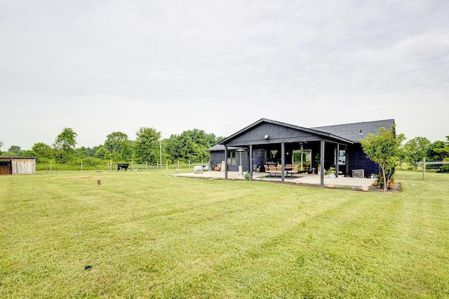9710 Butcher Rd, Mount Vernon, OH 43050 - view of grassy yard with a patio area