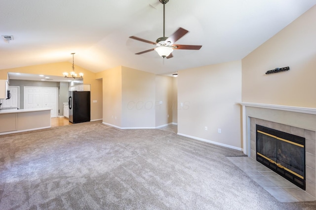 594 Chardonnay Ln, Lewis Center, OH 43035 - unfurnished living room featuring a fireplace, a ceiling fan, lofted ceiling, and light colored carpet