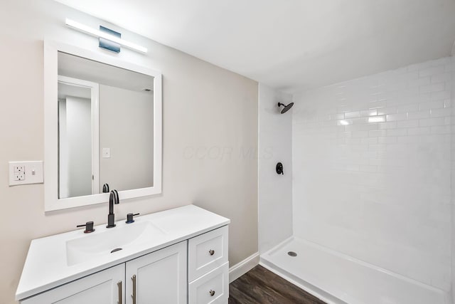 114 N Trine St, Canal Winchester, OH 43110 - full bath with vanity, a tile shower, and wood finished floors